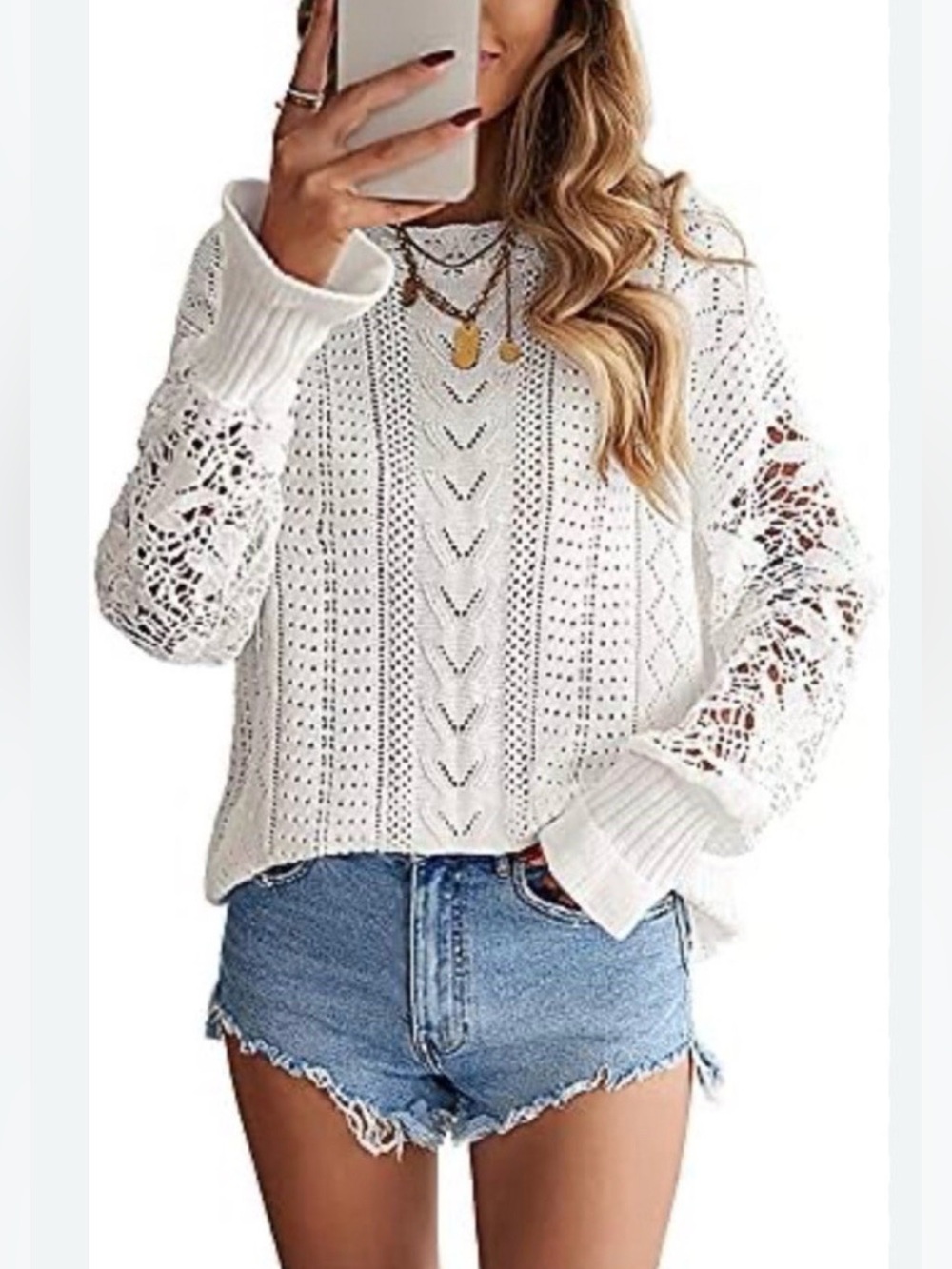 Theory Tissage crochet crewneck sweater in an ivory color.